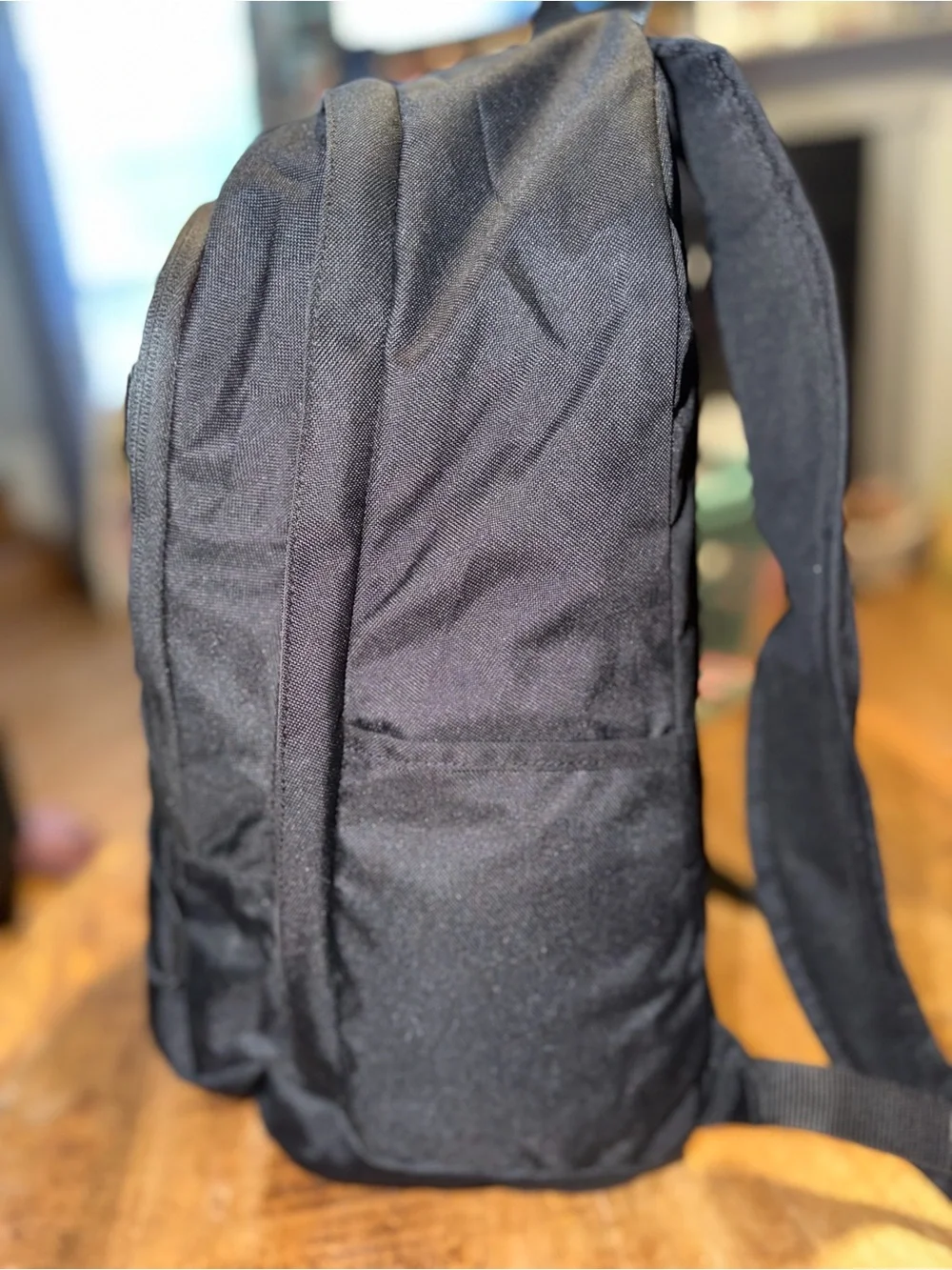 Nike Black Backpack with White Swoosh Graphic and Elastic Bungee